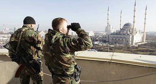 Сотрудники силовых структур в Грозном. Фото: REUTERS/Eduard Korniyenko 